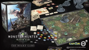 La boite du jeu de plateau Monster Hunter, ainsi que le plateau de jeu, les figurines et les jetons